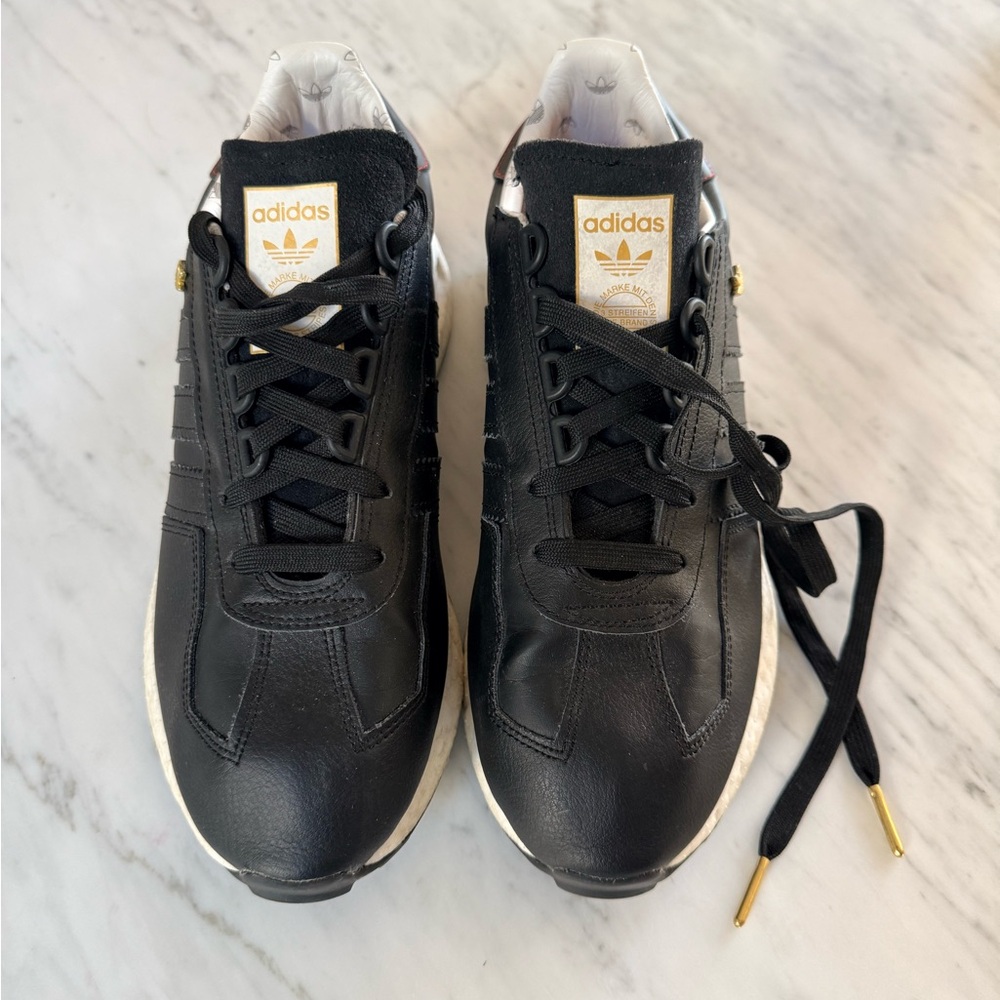 adidas Black and White Retro Runner Sneakers with Gold Accents - Picture 4 of 5
